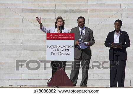 Stock Image - Terry O'Neill, President of National Organization of Women speaks at the National Action to Realize the Dream march and rally commemorating the 50th Anniversary of the march on Washington, D. C.. Fotosearch