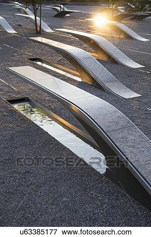 Stock Photo - The Pentagon Memorial honors 184 Americans who lost their life on 9/11/2001, Washington D. C.. Fotosearch