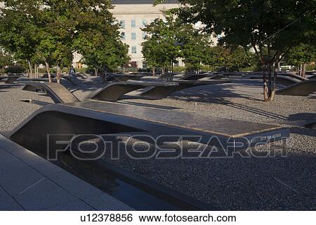 Stock Photograph - The Pentagon Memorial honors 184 Americans who lost their life on 9/11/2001, Washington D. C.. Fotosearch