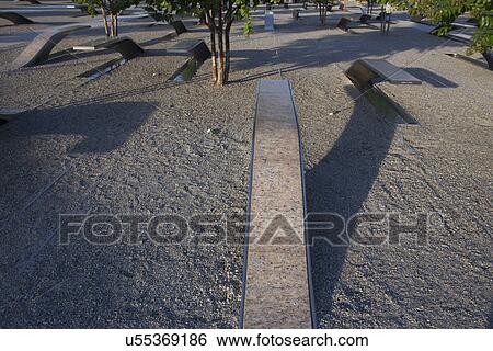 Stock Photograph - The Pentagon Memorial honors 184 Americans who lost their life on 9/11/2001, Washington D. C.. Fotosearch