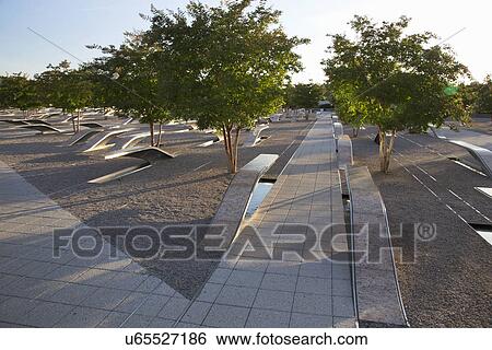Stock Photograph - The Pentagon Memorial honors 184 Americans who lost their life on 9/11/2001, Washington D. C.. Fotosearch