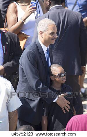 Stock Image - US Attorney General Eric Holder at the National Action to Realize the Dream march and rally commemorating the 50th Anniversary of the march on Washington, D. C.. Fotosearch