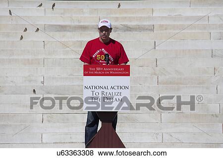 Stock Photo - Washington D. C. Mayor Vincent Gray speaks at the National Action to Realize the Dream march and rally commemorating the 50th Anniversary of the march on Washington, D. C.. Fotosearch