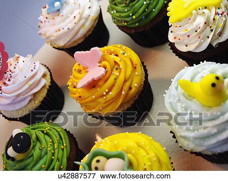Stock Photo - Birthday Cupcakes With Butterfly Decoration. Fotosearch