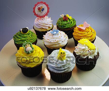 Birthday Cupcakes With Various Decorations View Large Photo Image Stock Photo - Birthday Cupcakes With Various Decorations. Fotosearch