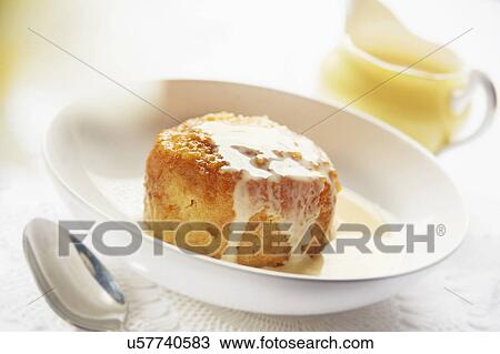 Bowl Of Steamed Syrup Pudding With Jug Of Custard View Large Photo Image Stock Image - Bowl Of Steamed Syrup Pudding With Jug Of Custard. Fotosearch
