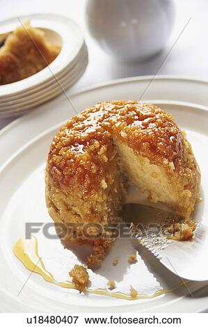 Bowl Of Steamed Syrup Pudding With Jug Of Custard View Large Photo Image Stock Photo - Bowl Of Steamed Syrup Pudding With Jug Of Custard. Fotosearch