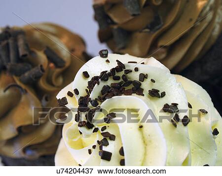 Chocolate And Vanilla Cupcakes Close Up In Studio View Large Photo Image Stock Photo - Chocolate And Vanilla Cupcakes Close Up In Studio. Fotosearch