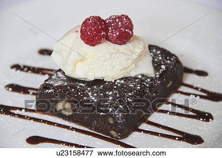Chocolate Brownie Cake With Cream View Large Photo Image Stock Photo - Chocolate Brownie Cake With Cream. Fotosearch