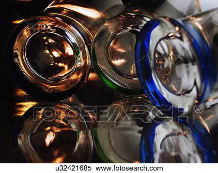 Stock Photography - Close Up Of Coloured Glasses Stacked Up. Fotosearch