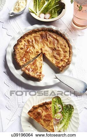 Picture - Homemade Ham And Egg Pie On Plate. Fotosearch