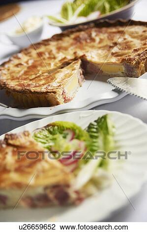 Stock Image - Homemade Ham And Egg Pie On Plate. Fotosearch