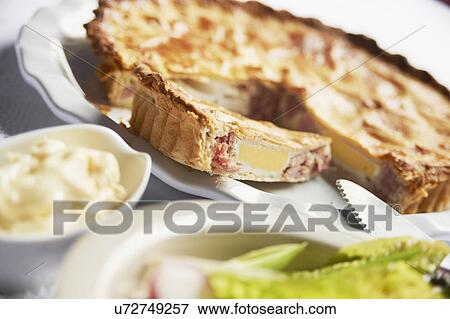 Stock Photo - Homemade Ham And Egg Pie On Plate. Fotosearch