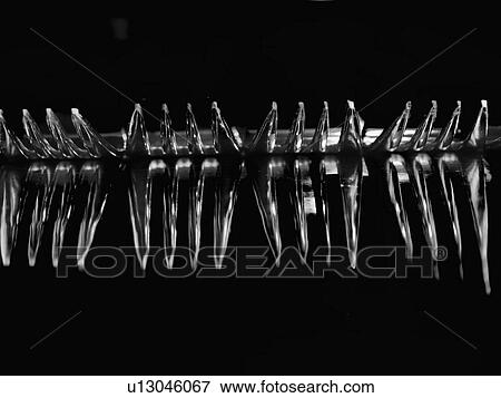 Stock Photo - Metal Forks Lined Up In An Abstract Way. Fotosearch