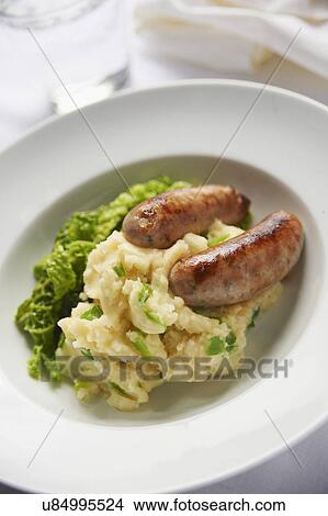 Plate Of Pork Sausages With Mashed Potato And Champ View Large Photo Image Picture - Plate Of Pork Sausages With Mashed Potato And Champ. Fotosearch