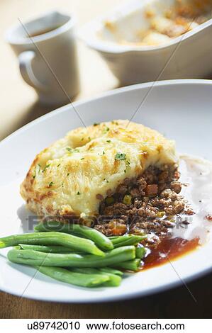 Plate Of Shepherds Pie With Green Beans View Large Photo Image Stock Image - Plate Of Shepherds Pie With Green Beans. Fotosearch