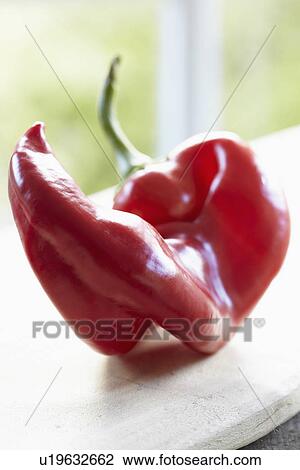Red Romano Pepper On Wooden Surface View Large Photo Image Stock Image - Red Romano Pepper On Wooden Surface. Fotosearch