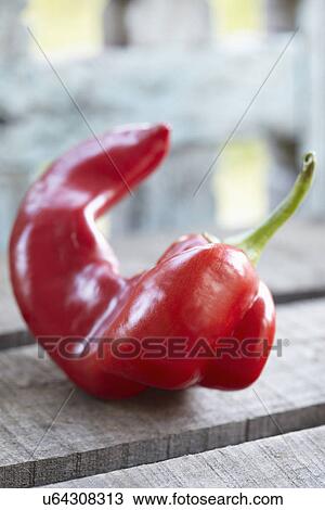 Red Romano Pepper On Wooden Surface View Large Photo Image Stock Image - Red Romano Pepper On Wooden Surface. Fotosearch