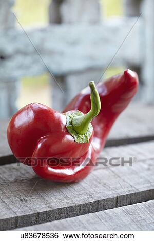 Red Romano Pepper On Wooden Surface View Large Photo Image Stock Photograph - Red Romano Pepper On Wooden Surface. Fotosearch