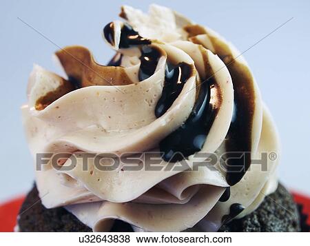 Single Strawberry Cupcake With Chocolate Sauce View Large Photo Image Stock Photo - Single Strawberry Cupcake With Chocolate Sauce. Fotosearch