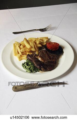 Sirloin Steak And Chips With Vegetables View Large Photo Image Stock Photograph - Sirloin Steak And Chips With Vegetables. Fotosearch