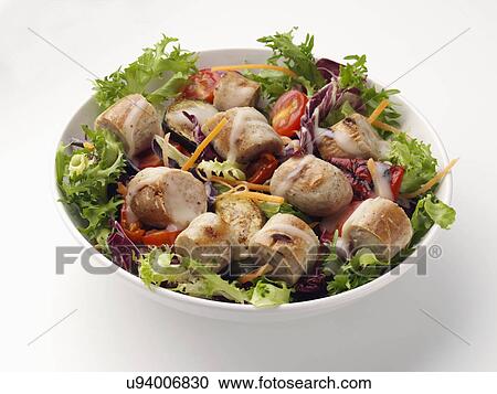 A bowl of bratwurst with salad on a neutral background View Large Photo Image Stock Image - A bowl of bratwurst with salad on a neutral background. Fotosearch