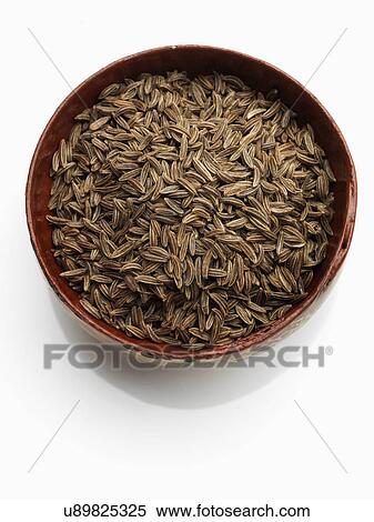 Stock Photography - A bowl of caraway seeds. Fotosearch
