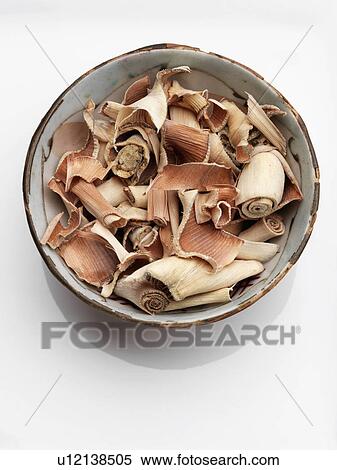 A bowl of dried lemongrass on a white background View Large Photo Image Stock Photography - A bowl of dried lemongrass on a white background. Fotosearch