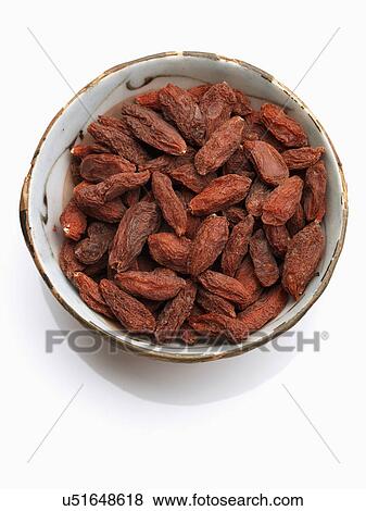 A bowl of goji berries on a white background View Large Photo Image Stock Photo - A bowl of goji berries on a white background. Fotosearch