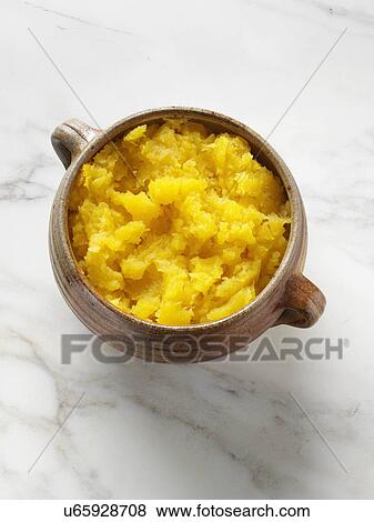 Stock Photo - A bowl of steamed mashed swede. Fotosearch