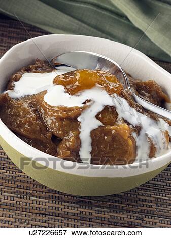 A bowl of vegetarian apricot mousse View Large Photo Image Stock Photo - A bowl of vegetarian apricot mousse. Fotosearch