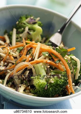 Stock Image - A bowl of vegetarian wild rice salad. Fotosearch