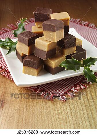 A pile of chocolate peanut fudge View Large Photo Image Stock Photo - A pile of chocolate peanut fudge. Fotosearch