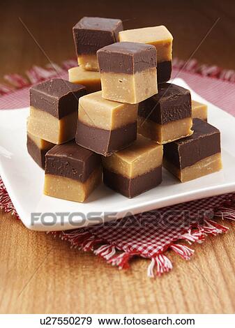 A pile of chocolate peanut fudge View Large Photo Image Stock Photo - A pile of chocolate peanut fudge. Fotosearch