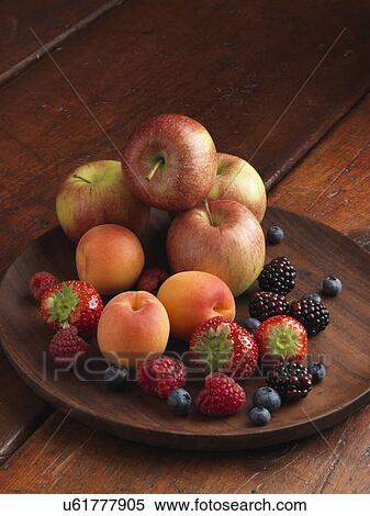 A pile of fresh ripe fruit apples strawberries blueberries blackberries raspberries and apricots View Large Photo Image Stock Photography - A pile of fresh ripe fruit apples strawberries blueberries blackberries raspberries and apricots. Fotosearch
