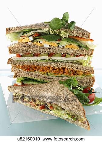 A pile of vegetarian sandwiches View Large Photo Image Stock Image - A pile of vegetarian sandwiches. Fotosearch