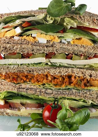 A pile of vegetarian sandwiches View Large Photo Image Stock Photo - A pile of vegetarian sandwiches. Fotosearch