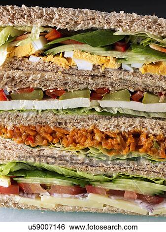 A pile of vegetarian sandwiches View Large Photo Image Stock Photograph - A pile of vegetarian sandwiches. Fotosearch