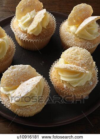 A plate of butterfly cakes View Large Photo Image Stock Image - A plate of butterfly cakes. Fotosearch