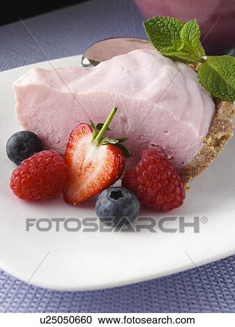 Stock Image - A slice of pink lemonade pie. Fotosearch