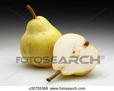 A whole and half a ripe pear View Large Photo Image Stock Photo - A whole and half a ripe pear. Fotosearch