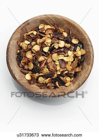 A wooden bowl of crushed chillies on a white background View Large Photo Image Stock Image - A wooden bowl of crushed chillies on a white background. Fotosearch