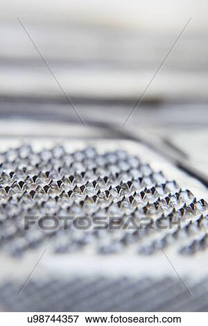 Stock Photo - Abstract View Of Metal Grater. Fotosearch