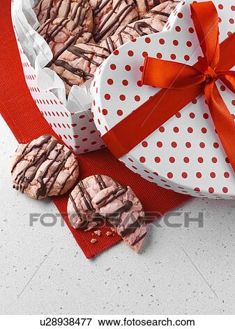 American strawberry cookies for Valentines Day in a heart shaped box View Large Photo Image Stock Photo - American strawberry cookies for Valentines Day in a heart shaped box. Fotosearch