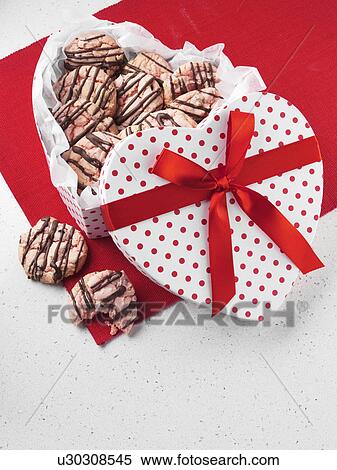 American strawberry cookies for Valentines Day in a heart shaped box View Large Photo Image Stock Photography - American strawberry cookies for Valentines Day in a heart shaped box. Fotosearch