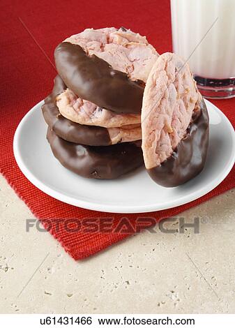 Stock Photograph - American strawberry cookies with milk. Fotosearch
