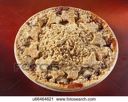 Stock Image - Apple cranberry crumble pie. Fotosearch