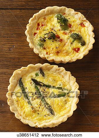 Stock Image - Asparagus pea tart and broccoli red pepper tart. Fotosearch