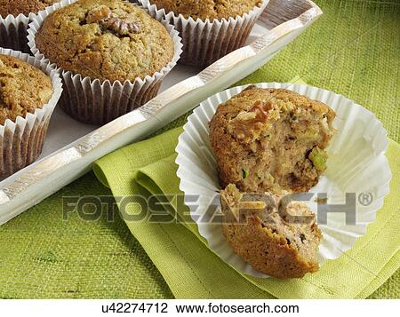 Stock Image - Avocado zucchini muffins. Fotosearch