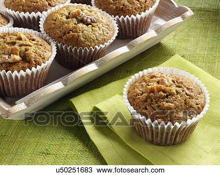 Stock Image - Avocado zucchini muffins. Fotosearch
